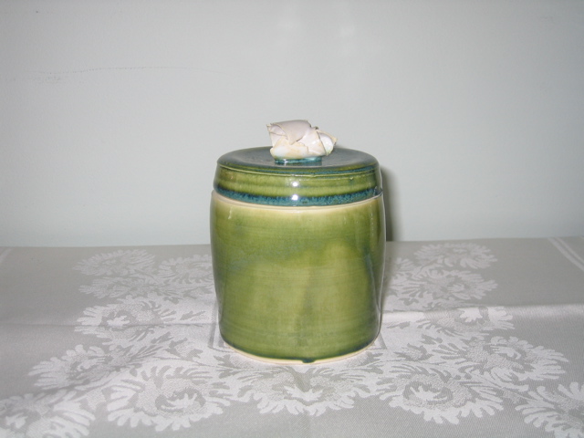Container with white flower - 1
